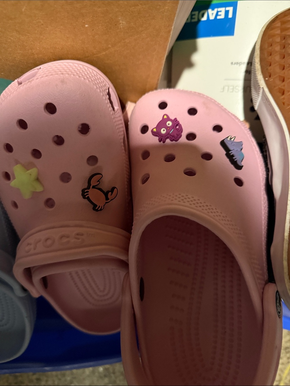 CROCS womens Light Pink Clogs with Charms